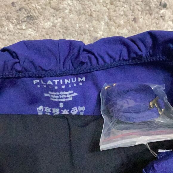 New. Platinum by PilyQ navy swimsuit. Retails $164 - Picture 9 of 11
